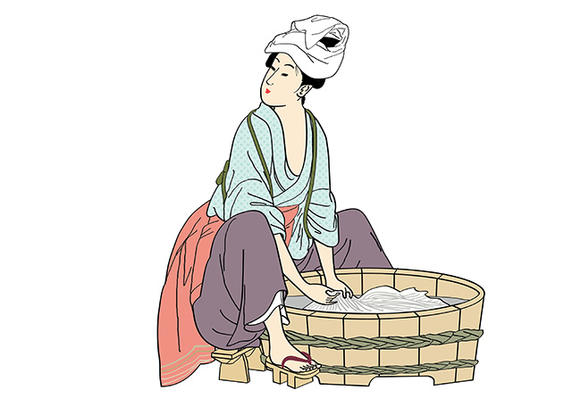 着物を洗っている女性